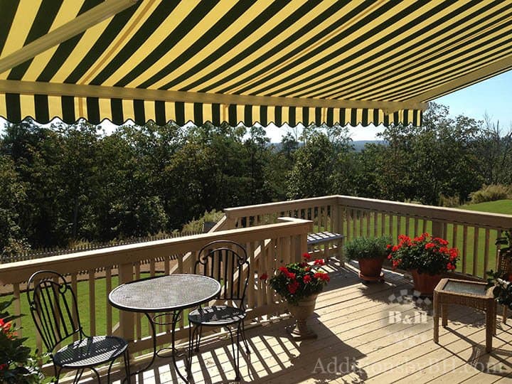 A black and yellow awning, with our logo.