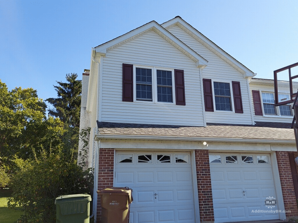 Cropped Image of Home with Two Garage Doors and Garden on left | Additions By B&H | Chalfont, PA | 215-997-6620